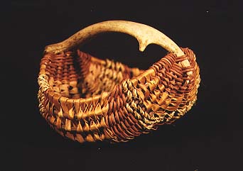 [Picture of a small antler basket made from natural materials]